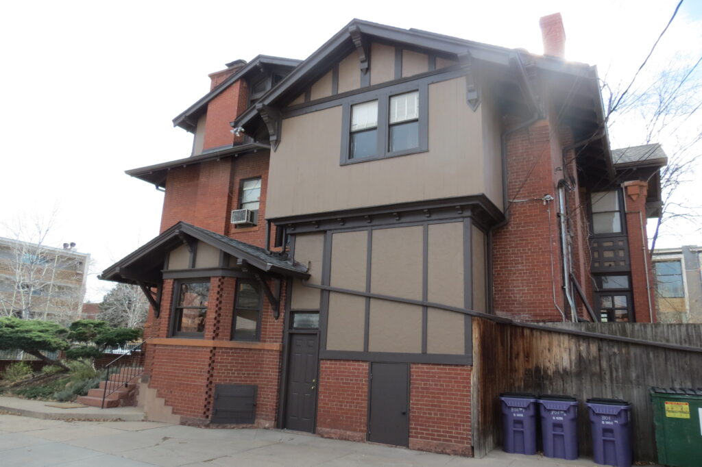 Two-story brick and wood house Historical Denver Painting Services
