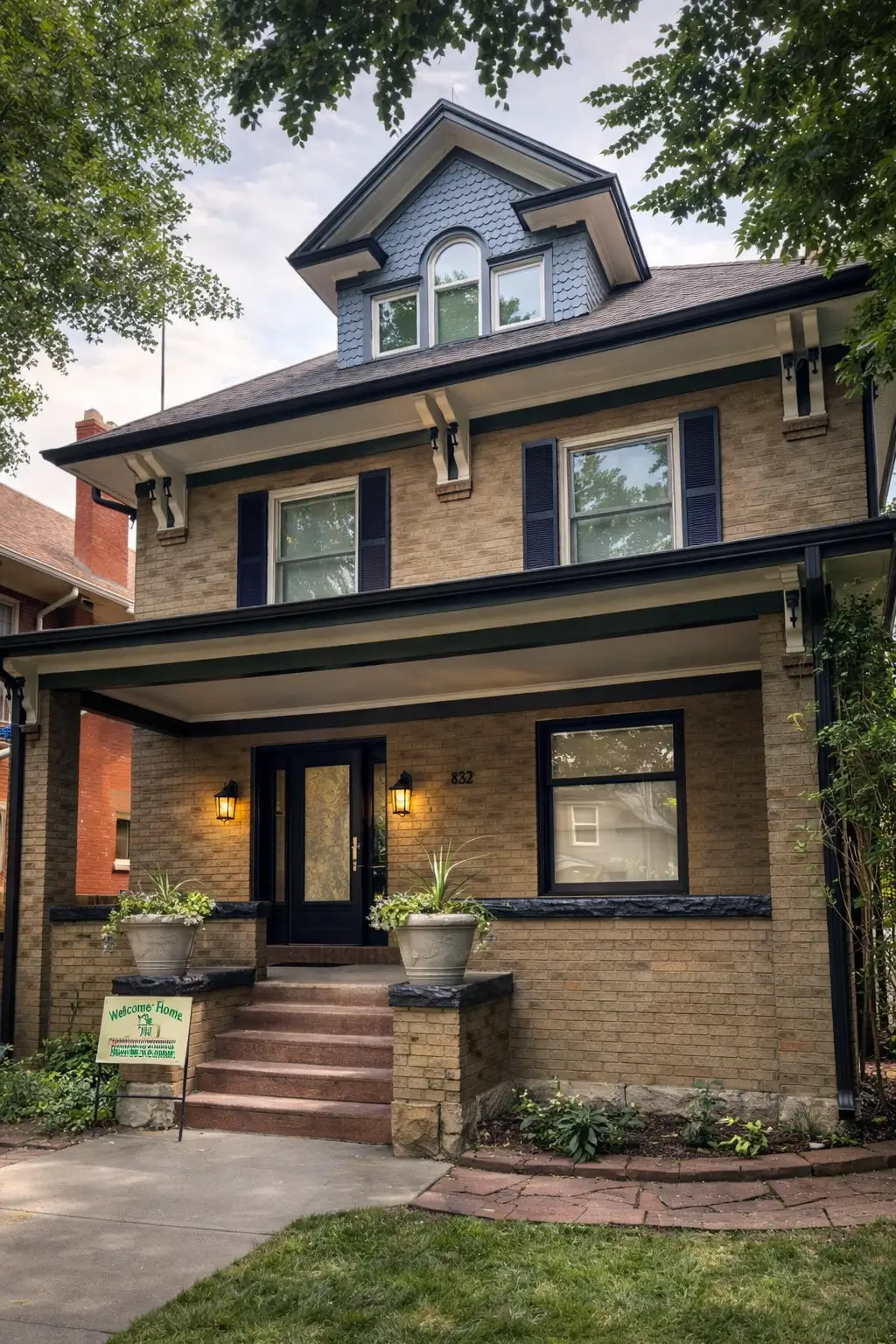 historical home painting in denver for a brick two story home